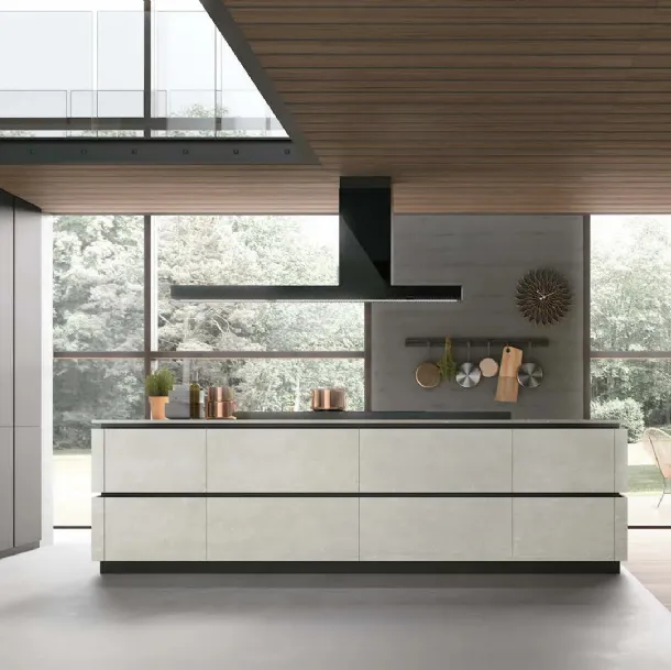 Cuisine moderne avec îlot Metropolis 10 en pet et matériau Ciment Blanc de Stosa.