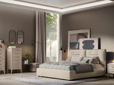 Lettino Arcadia Kiss en tissu rembourré de la maison Colombini.