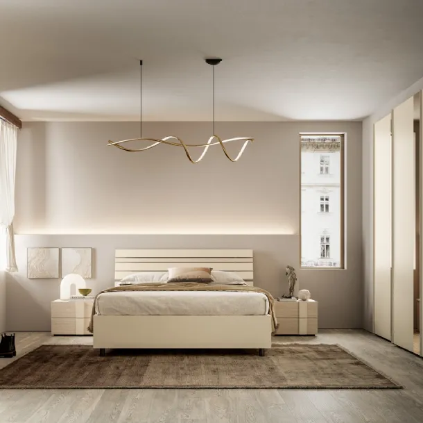 Lit avec une tête de lit Baya de SantaLucia