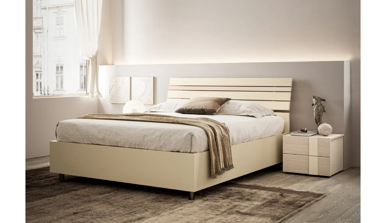 Lit avec une tête de lit Baya de SantaLucia