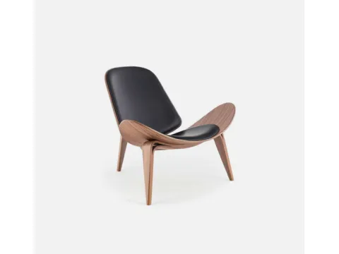 Fauteuil design en bois avec assise en cuir de Sigerico.