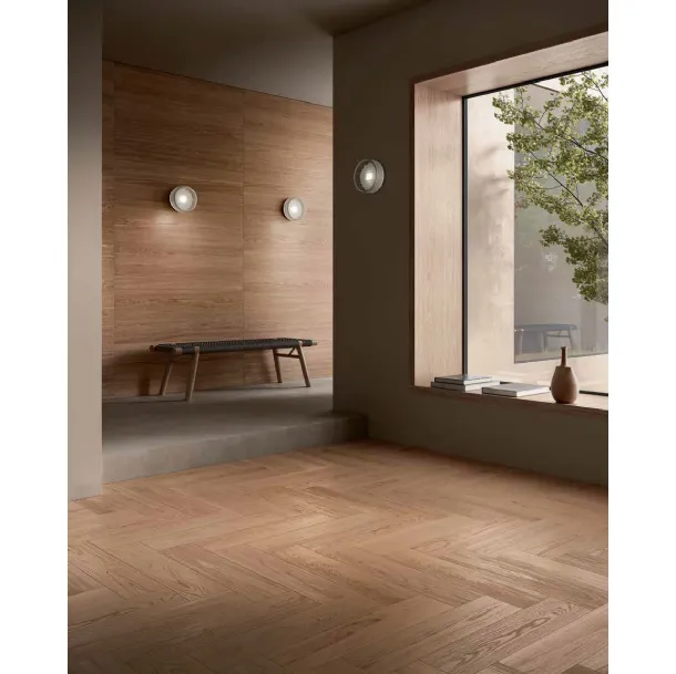 Parquet en chêne à motif épine italienne, finition poudre de girofle.