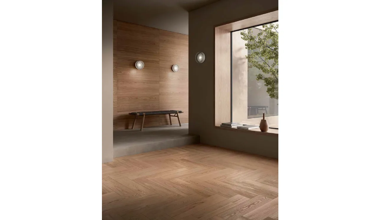 Parquet en chêne à motif épine italienne, finition poudre de girofle.