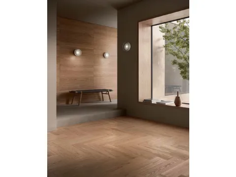 Parquet en chêne à motif épine italienne, finition poudre de girofle.